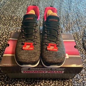 Womens size 11 Skechers tennis shoes. Brand new never worn.